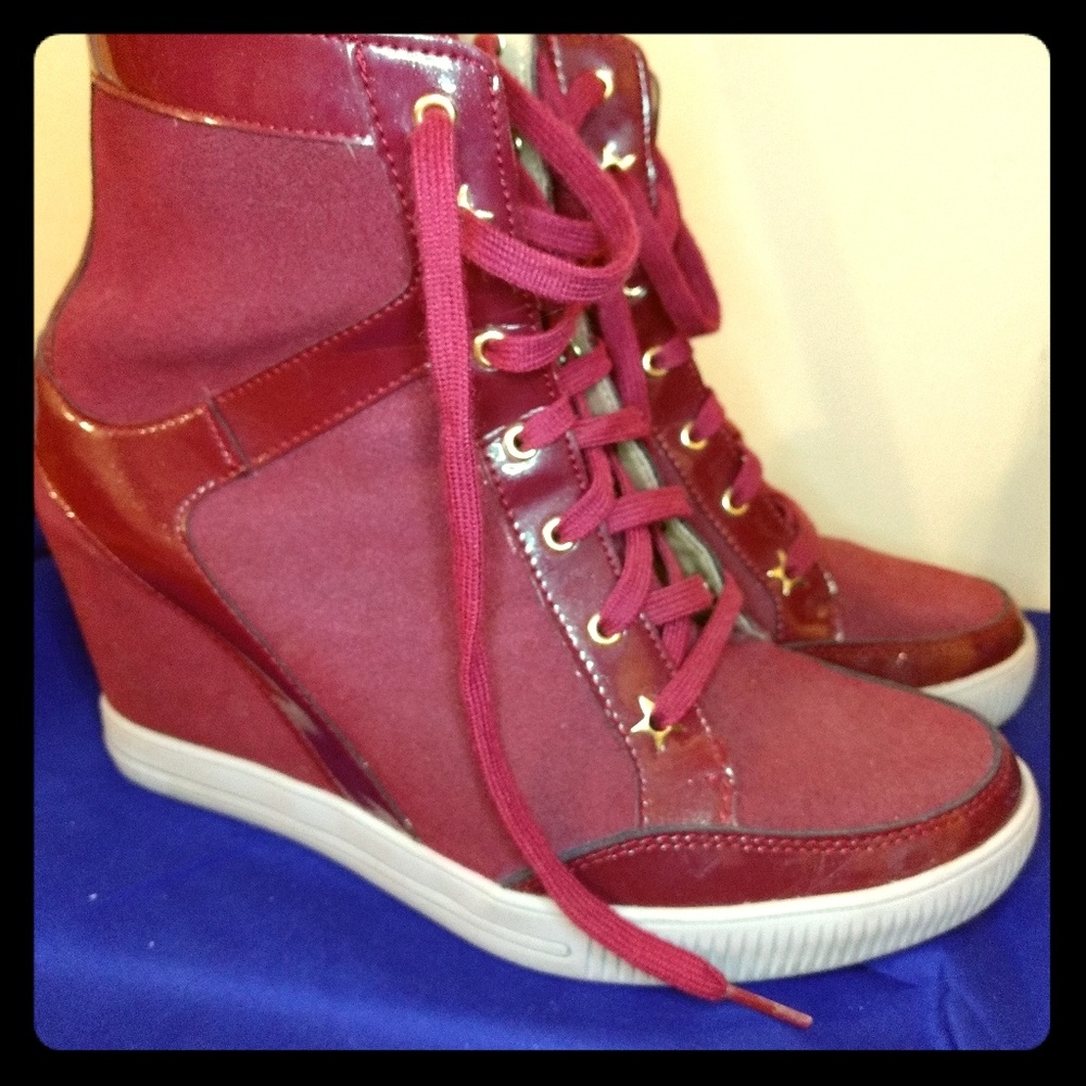 Red Skechers wedge sneakers